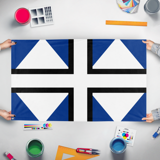 A mockup of the custom flag 'Geocotio flag' held up on a table during print checking
