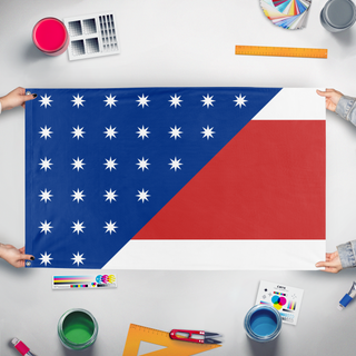 A mockup of the custom flag 'Nuzz Rebelion flag' held up on a table during print checking