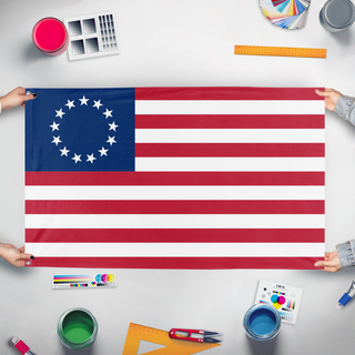A mockup of the custom flag 'dfdf flag' held up on a table during print checking