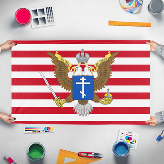 A mockup of the custom flag 'American Orthodox flag' held up on a table during print checking