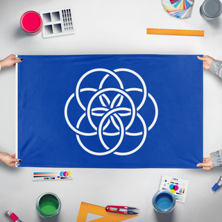 A mockup of the custom flag 'Earth flag' held up on a table during print checking