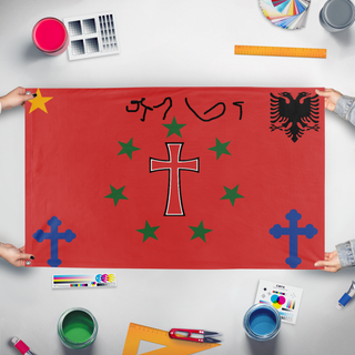 A mockup of the custom flag 'Kakia flag' held up on a table during print checking