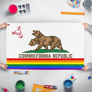 A mockup of the custom flag 'Queer Commiefornia flag' held up on a table during print checking