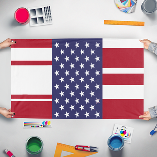 A mockup of the custom flag 'da amerikkkan flag' held up on a table during print checking