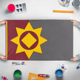 A mockup of the custom flag 'Grusan flag' held up on a table during print checking