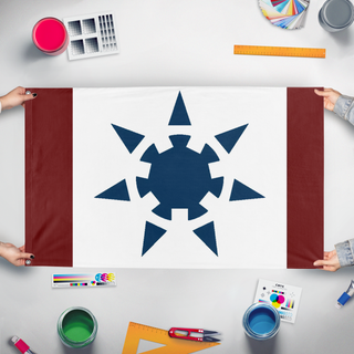 A mockup of the custom flag 'Hydra flag' held up on a table during print checking