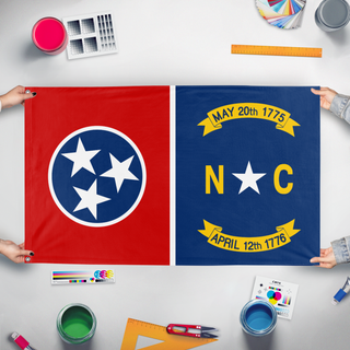 A mockup of the custom flag 'Tennessee - North Carolina Heritage flag' held up on a table during print checking