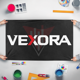 A mockup of the custom flag 'vexora3 flag' held up on a table during print checking