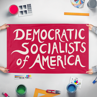 A mockup of the custom flag 'Democratic Socialists of America flag' held up on a table during print checking