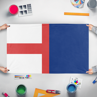 A mockup of the custom flag 'Canon 1 flag' held up on a table during print checking