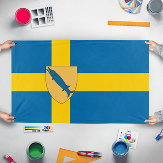 A mockup of the custom flag 'custom flag' held up on a table during print checking