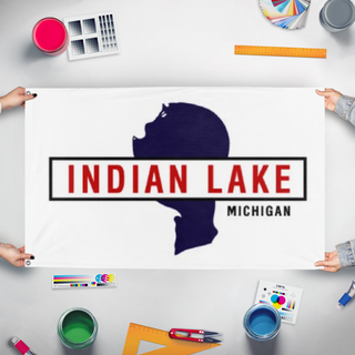 A mockup of the custom flag 'Indian Lake flag' held up on a table during print checking