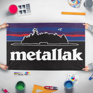 A mockup of the custom flag 'Metallak Island flag' held up on a table during print checking