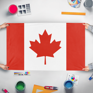 A mockup of the custom flag 'Canada flag' held up on a table during print checking