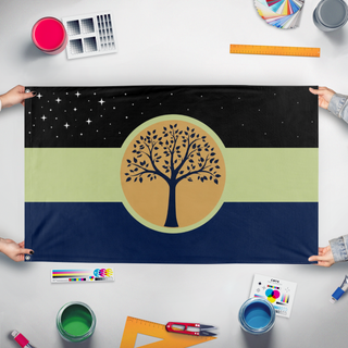 A mockup of the custom flag 'FreeMars flag' held up on a table during print checking