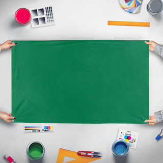 A mockup of the custom flag 'CanonProduct flag' held up on a table during print checking
