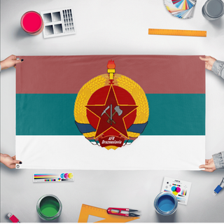 A mockup of the custom flag 'AFR Druznoslavia flag' held up on a table during print checking