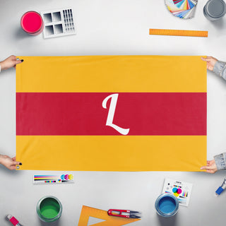 A mockup of the custom flag 'A. A. Low/Brother flag' held up on a table during print checking