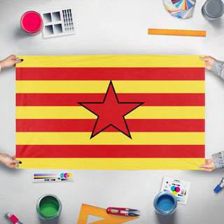 A mockup of the custom flag 'Aragon Independence Flag' held up on a table during print checking