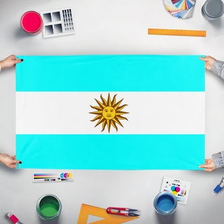 A mockup of the custom flag 'Argentina flag' held up on a table during print checking