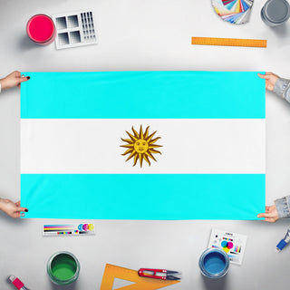 A mockup of the custom flag 'Argentina flag' held up on a table during print checking