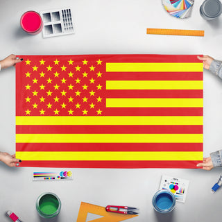 A mockup of the custom flag 'Asian American Heritage Flag' held up on a table during print checking
