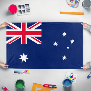 A mockup of the custom flag 'Australia flag' held up on a table during print checking