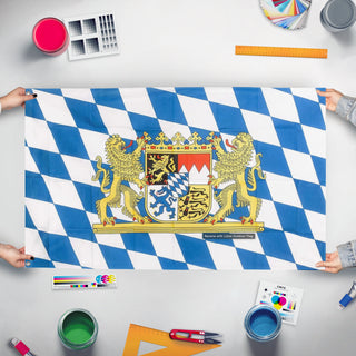 A mockup of the custom flag 'Bavarian Flag' held up on a table during print checking