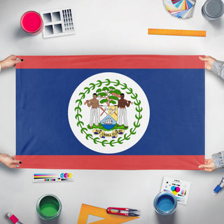A mockup of the custom flag 'Belice flag' held up on a table during print checking