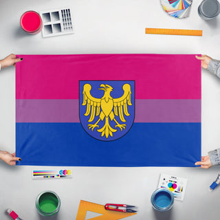 A mockup of the custom flag 'Bisexual Upper Silesia flag' held up on a table during print checking