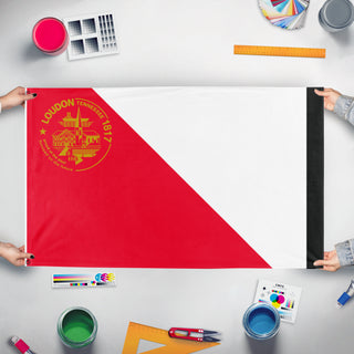 A mockup of the custom flag 'CITY OF LOUDON, TN  flag' held up on a table during print checking