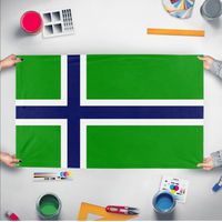 A mockup of the custom flag 'Carrland flag' held up on a table during print checking