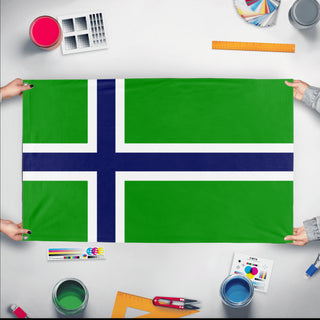 A mockup of the custom flag 'Carrland flag' held up on a table during print checking