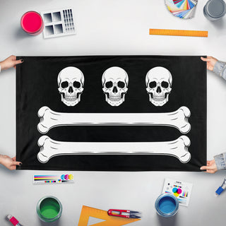 A mockup of the custom flag 'Christopher Condent Pirate flag' held up on a table during print checking