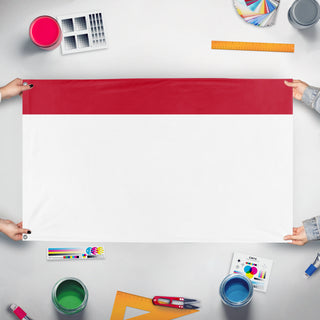 A mockup of the custom flag 'Custom Companion Flag' held up on a table during print checking