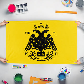 A mockup of the custom flag 'Double Headed Aquila flag' held up on a table during print checking