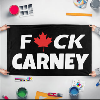 A mockup of the custom flag 'F- Carney flag' held up on a table during print checking