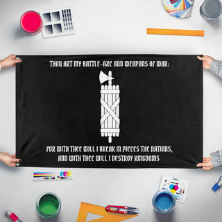 A mockup of the custom flag 'Fasces flag' held up on a table during print checking