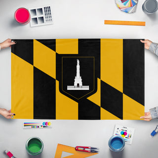 A mockup of the custom flag 'Flag of Baltimore, Maryland' held up on a table during print checking