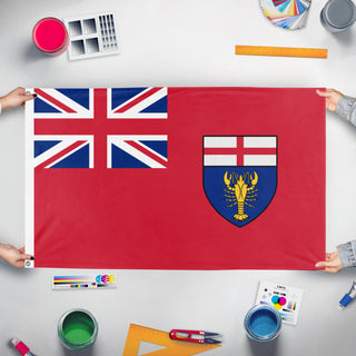 A mockup of the custom flag 'Flag of Canadian New Ireland' held up on a table during print checking