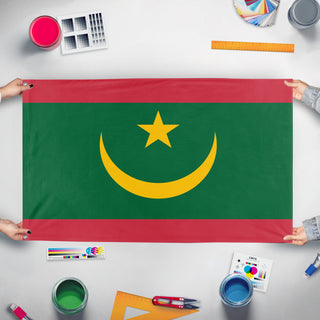 A mockup of the custom flag 'Flag of Mauritania' held up on a table during print checking