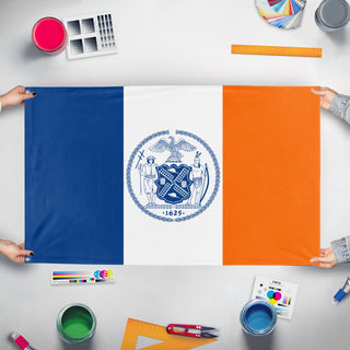 A mockup of the custom flag 'Flag of New York City' held up on a table during print checking