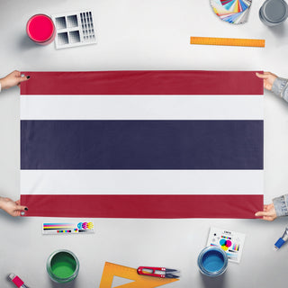 A mockup of the custom flag 'Flag of Thailand' held up on a table during print checking