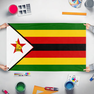 A mockup of the custom flag 'Flag of Zimbabwe' held up on a table during print checking