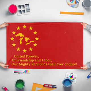 A mockup of the custom flag 'Great Lakes Liberation  flag' held up on a table during print checking