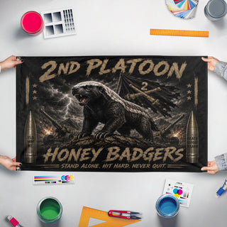 A mockup of the custom flag 'Honey Badger flag' held up on a table during print checking