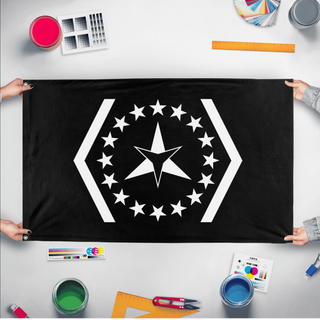 A mockup of the custom flag 'IDTHR flag' held up on a table during print checking