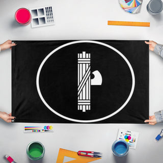 A mockup of the custom flag 'ITPC FLAG' held up on a table during print checking