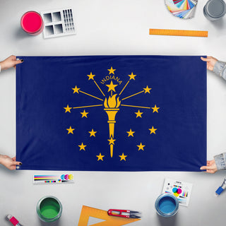 A mockup of the custom flag 'Indiana State Flag' held up on a table during print checking