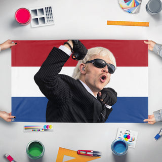 A mockup of the custom flag 'Joost flag' held up on a table during print checking